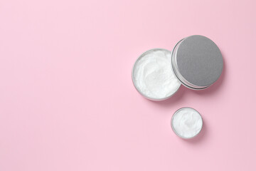 Natural cosmetic products a pink background, top view