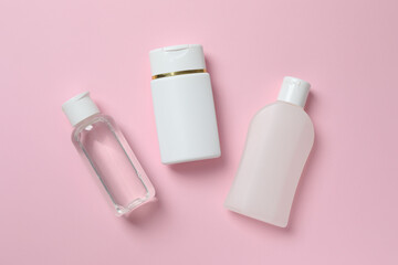 Natural cosmetic products a pink background, top view