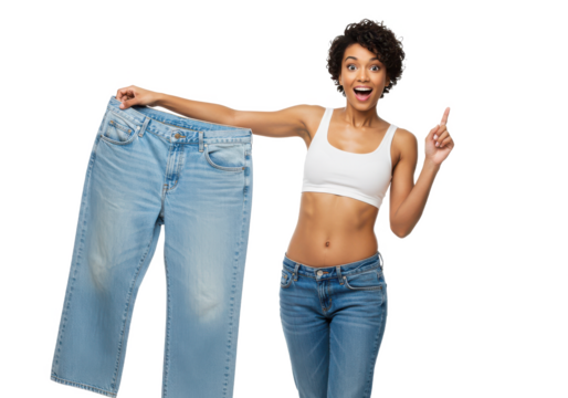 Woman astonished with results of her slimming and weight loss pulling large oversize jeans isolated on White background PNG transparent background - Powered by Adobe