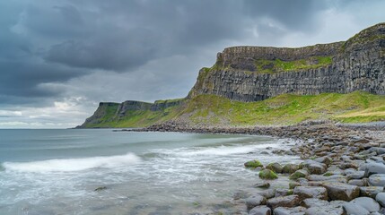 Coastal Cliff Landscape with Rocky Shoreline and Overcast Sky