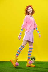 model in bright clothes