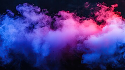 Abstract colored smoke clouds on dark background. Possible use for digital art, design, or product displays.