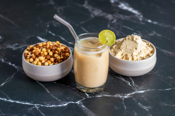 Sattu drinks are protein-rich, refreshing beverages made from roasted gram flour, mixed with water, spices, lemon, and sometimes jaggery for sweetness. They are nutritious, cooling, and energizing.