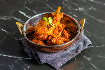 Chicken Bhuna Masala is a rich, aromatic Indian dish with tender chicken simmered in a thick, spicy, and flavorful tomato-based gravy.