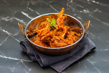 Chicken Bhuna Masala is a rich, aromatic Indian dish with tender chicken simmered in a thick, spicy, and flavorful tomato-based gravy.