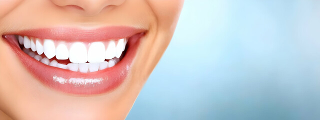 Fototapeta premium A close-up of a smiling mouth showcases bright white teeth and a radiant smile, embodying happiness and positivity.