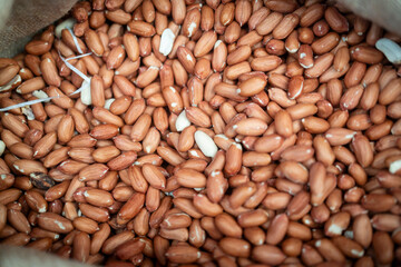 Shelled peanuts in a bag in the spice section.