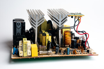 printed circuit board with electronic components on a white background