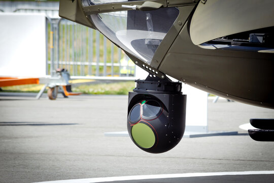 Fototapeta Camera sensor pods under an aerial surveillance helicopter