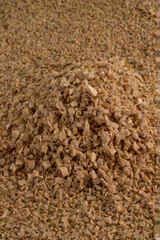 Sawdust. Small sawdust scattered after pruning a large branch.