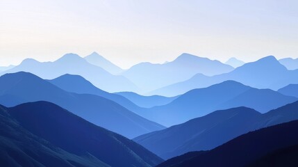 Fototapeta premium Serene Blue Mountain Range: A scenic landscape of layered mountains fading into the distance in shades of blue. Perfect for backgrounds.