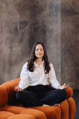 Businesswoman Practicing Mindfulness Meditation for Work-Life Balance