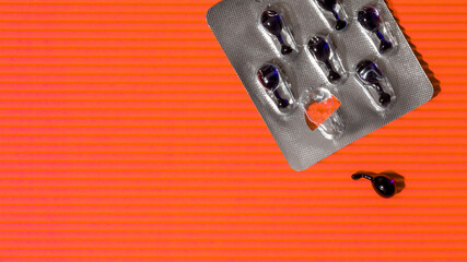 Blister pack with missing capsule, modern medicine, healthcare concept, vibrant orange background,...