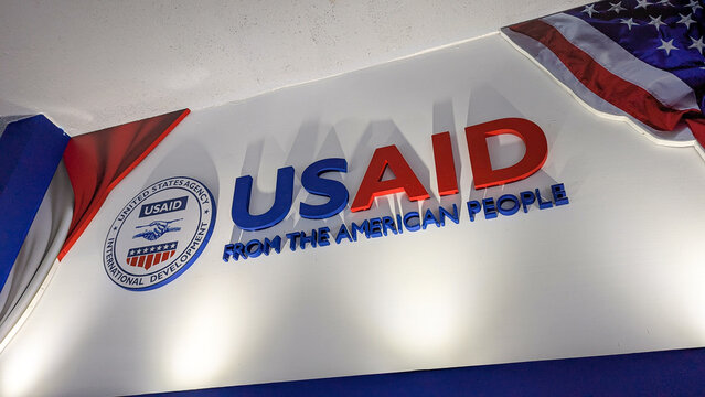 Closeup of USAID from the American People sign, logo, and flag on display in Banda Aceh, Indonesia - taken on 1st Dec 2024