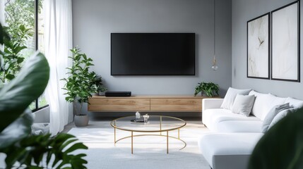 A minimalist modern living room with a white sectional sofa and cool gray walls