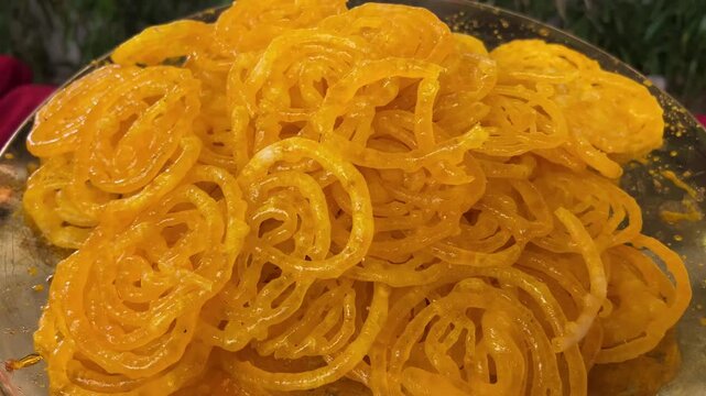 Close up shot of Fried jalebi in a road side dhaba in India