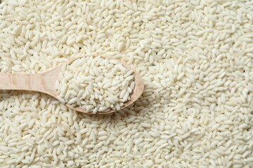 Composition with white rice in the spoon