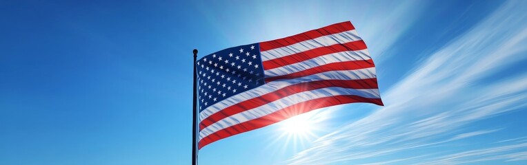 Obraz premium American Flag Waving in the Breeze Against a Beautiful Cloudy Sky in Full Detail