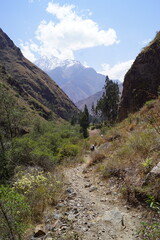 Hiking in the lush Urubamba Sacred Valley along the hidden Inca Trail in Peru