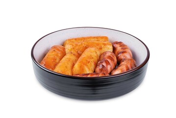 Fried sausages with spicy tomato sauce teokbokki in a bowl on a white isolated background