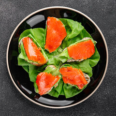 Salmon sandwich red fish seafood appetizer dish fresh tasty gourmet food background on table rustic food top view copy space pescetarian diet
