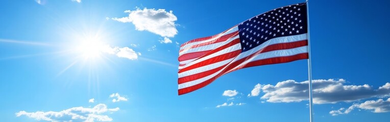 American Flag Waving Against a Clear Blue Sky