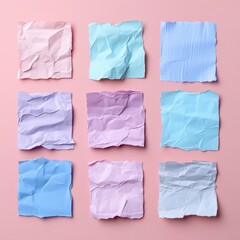 Obraz premium Pastel colored crumpled paper squares on pink backdrop creating a visually appealing and modern background perfect for creative projects and designs