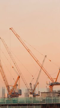 Long Arm Cranes Transform Bridgetown, Pasig City, Philippines.
Numerous long-arm cranes working in unison, symbolizing the rapid development and urban transformation of the area.