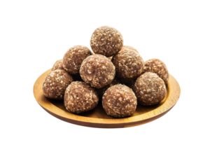 A pile of flax seed laddus on a wooden plate, Sweets laddu on Png Format and Transparent Background