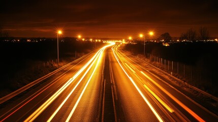 Highway at Night with Car Light Trails under a Dark Sky Long Exposure Photography Capturing Motion and Energy