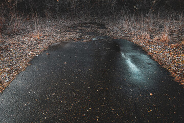 a dead end road or path that is closed off after a rain nature landscape. concept of obstacle,...
