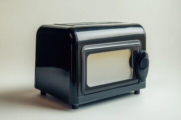 Sleek Black Toaster Oven Against a Natural Backdrop: A Modern Kitchen Appliance for Every Home