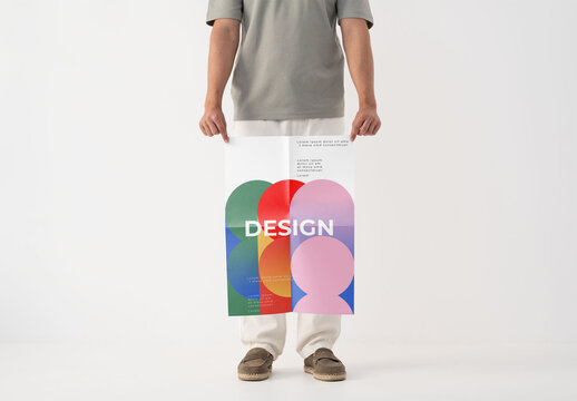 Mockup Of Man Holding Customized Poster, Low Section