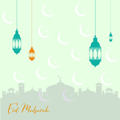 Eid Mubarak calligraphy means happy holiday with beautiful blue arabesque patterns and hanging lanterns