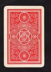 The back of a decorative vintage playing card.