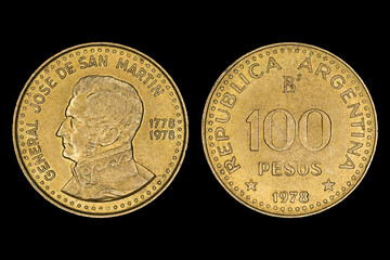 Republic of Argentina peso coin isolated on a black background