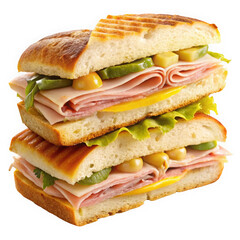 A delicious stacked sandwich featuring layers of ham, lettuce, pickles, and mustard on toasted buns.