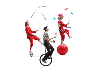 Group of entertainers juggling