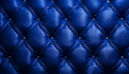 Naklejka premium A plush, quilted velvet background in deep royal blue, with diamond-shaped stitching 