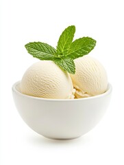 Two scoops of creamy vanilla ice cream in a white bowl, garnished with fresh mint leaves. Close up studio shot on white