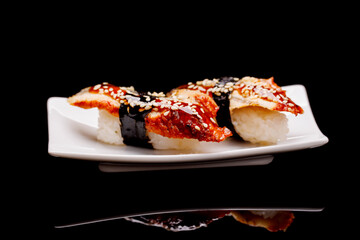 Unagi sushi beautifully arranged on plate
