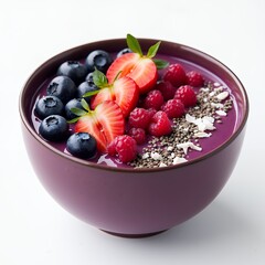 A deep bowl filled with a vibrant purple acai smoothie, topped with fresh berries (strawberries, blueberries, raspberries), coconut flakes, and chia seeds.