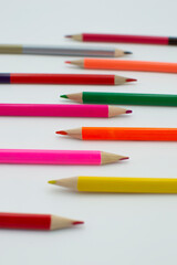 colored pencils on white background