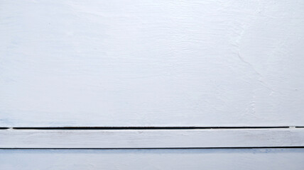 Wood layer texture painted with white color. Texture background of white wooden for grunge, painting, handmade, rough, old cabinet, and hard object. White layering texture background with copy space.
