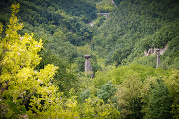 Rock formations, also known as fairy chimneys, earth pyramids, hoodoos, Piramidi di Zone, Italy