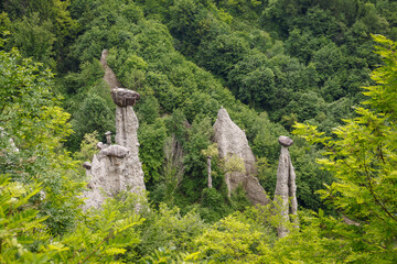 Rock formations, also known as fairy chimneys, earth pyramids, hoodoos, Piramidi di Zone, Italy