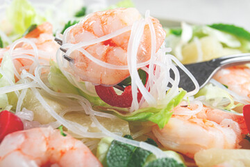 Thai salad with shrimp and rice noodles, pineapple slices, coriander and mint leaves, homemade , no people,