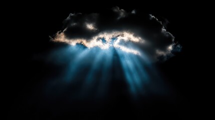 Light piercing through a dark cloud.  A dramatic sky with beams of light radiating from a gap in a dense cloud formation