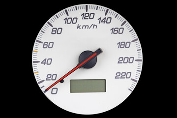 White analog speedometer with red needle