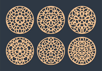 Laser cut patterned coasters, decorative round ornaments.	
